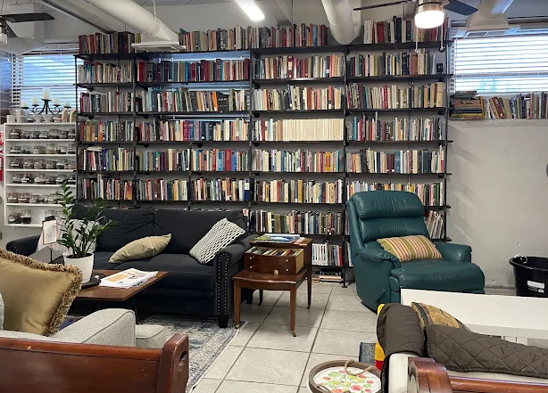 shelves of books in a coffee shop